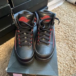 Red and black Jordan 2s